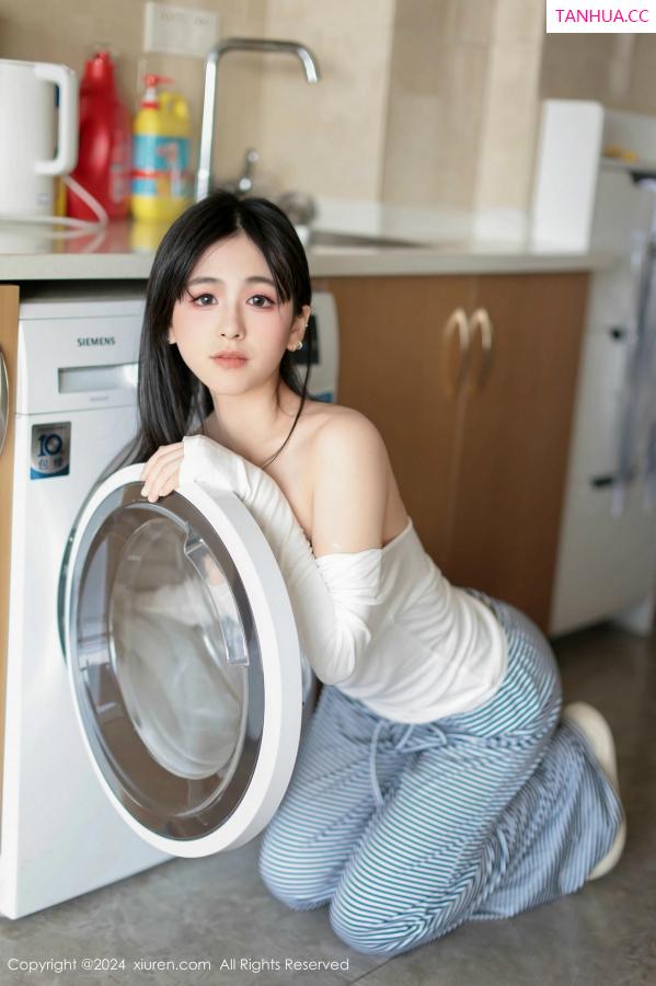   [XiuRen]高清写真图 2024.12.16 No.9605 奶芙乔乔 美腿黑丝第29张图片